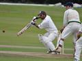 Qasim Sheikh completes his century.jpg